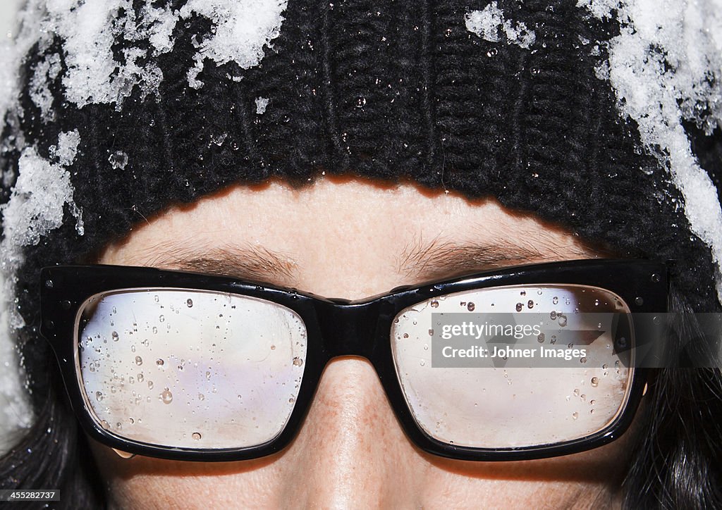 Woman with steamy glasses