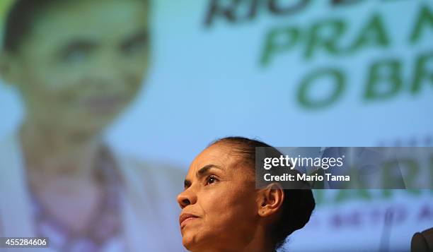 Marina Silva, presidential candidate of the Brazilian Socialist Party, looks on while attending a campaign event at the Engineering Club on September...