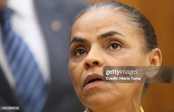 Marina Silva, presidential candidate of the Brazilian Socialist Party, looks on at a news conference before a campaign event at the Engineering Club...