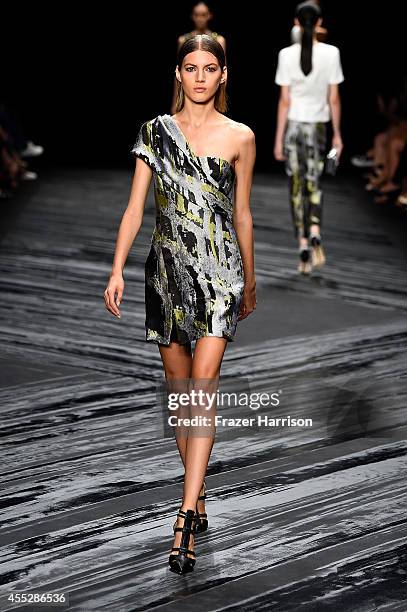 Model walks the runway at the J.Mendel fashion show during Mercedes-Benz Fashion Week Spring 2015 at The Theatre at Lincoln Center on September 11,...