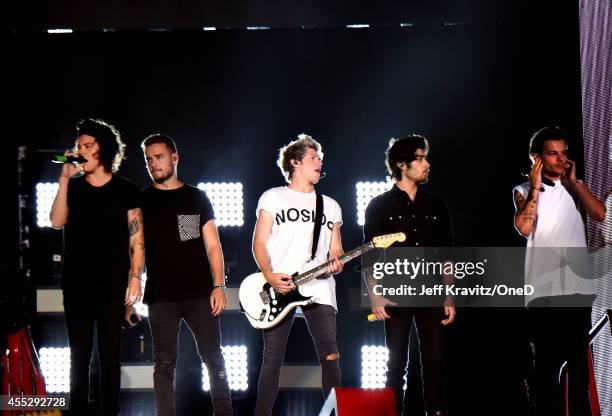 Harry Styles, Liam Payne, Niall Horan, Zayn Malik and Louis Tomlinson of One Direction perform onstage during the One Direction" Where We Are" Tour...