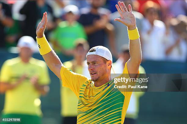 Lleyton Hewitt of Australia celebrates winning the rubber in his singles match against Farrukh Dustov of Uzbekistan during the Davis Cup World Group...