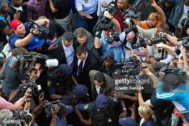 Oscar Pistorius arrives at the Pretoria High Court on September 12 in Pretoria, South Africa. Oscar Pistorius, stands accused of the murder of his...