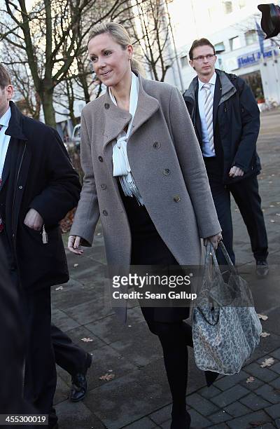 Former German First Lady Bettina Wulff arrives to testify in the trial of her estranged husband, former German President Christian Wulff, at the...