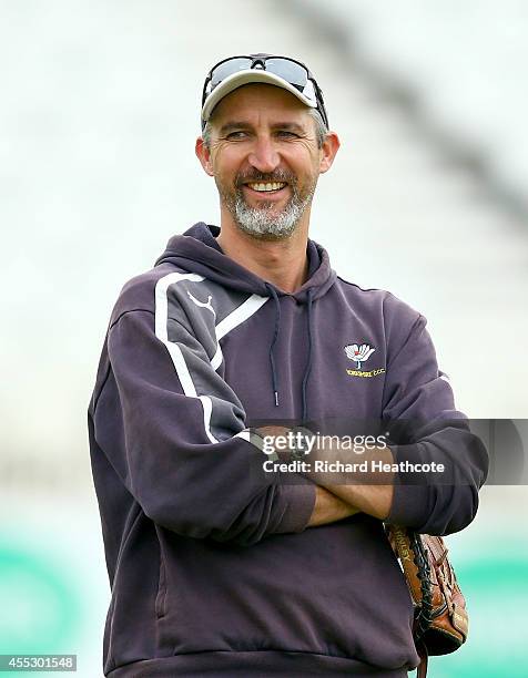 Yorkshire coach Jason Gillespie looks on as the team warms up during the fourth day of the LV County Championship match between Nottinghamshire and...