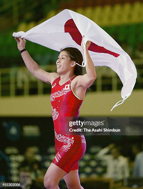 Saori Yoshida of Japan celebrates after winning the gold medal in the Women's 53kg during day four of the FILA World Wrestling Championships at...