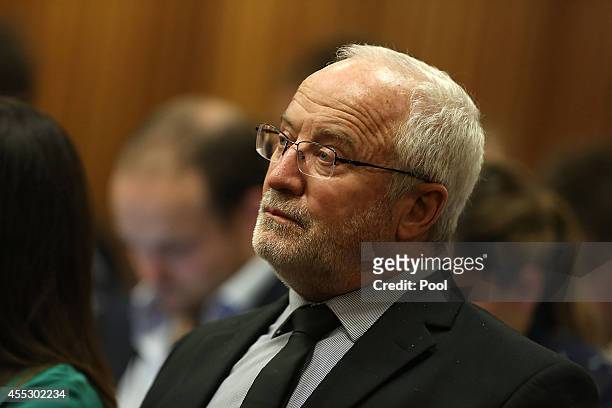 Oscar Pistorius's father Henke Pistorius sits during Oscar Pistorius' trial at the Pretoria High Court on September 12 in Pretoria, South Africa....