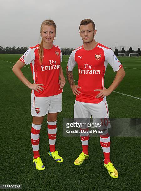 Jack Wilshere of Arsenal and Leah Williamson of Arsenal Ladies during the 1st team squad photograph at London Colney on September 11, 2014 in St...