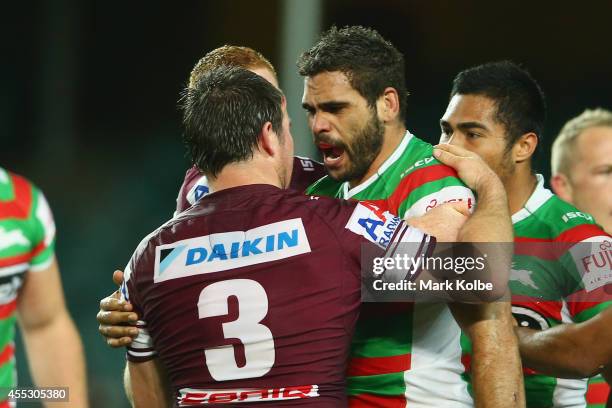 Jamie Lyon of the Sea Eagles and Greg Inglis of the Rabbitohs exchange heated words during the NRL 2nd Qualifying Final match between the Manly Sea...