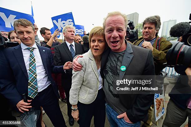 Deputy First Minister Nicola Sturgeon and actor Peter Mullan campaign for the 'Yes' vote in Drumchapel on September 12,2014 in GlasgowScotland. With...