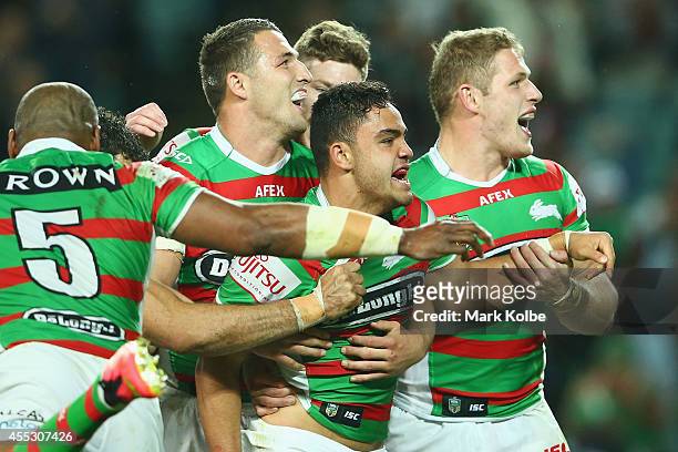 Dylan Walker of the Rabbitohs celebrates with his team mates after scoring a try during the NRL 2nd Qualifying Final match between the Manly Sea...