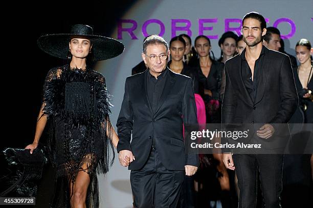 Spanish designer Roberto Verino walks the runway at the end of Roberto Verino show during Mercedes Benz Fashion Week Madrid Spring/Summer 2015 at...