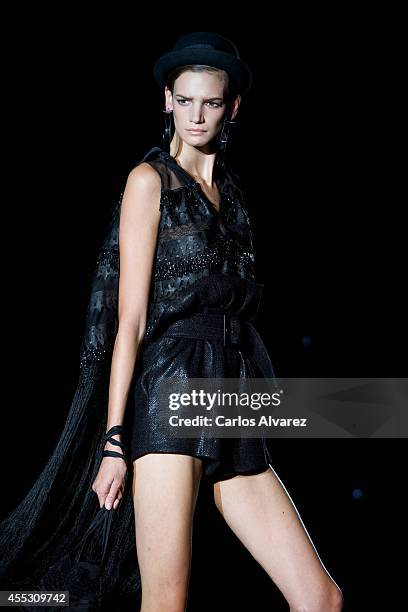 Model showcases designs by Roberto Verino on the runway at Roberto Verino show during Mercedes Benz Fashion Week Madrid Spring/Summer 2015 at Ifema...