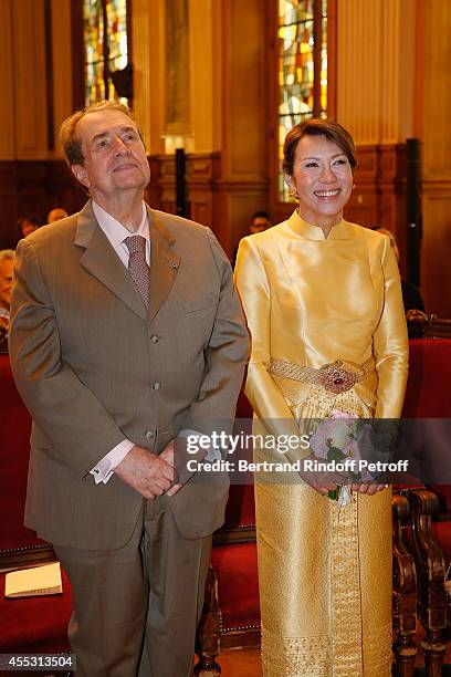 Francois Florent and Kanee Danevong attend the Wedding of Francois Florent And Kanee Danevong at Mairie Du XVIII, on September 12, 2014 in Paris,...