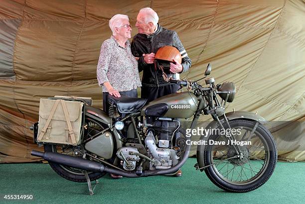 George Brown, aged 91, with his wife Thelma, helps to celebrate the unveiling of the new Royal Enfield accessory range inspired by World War II...