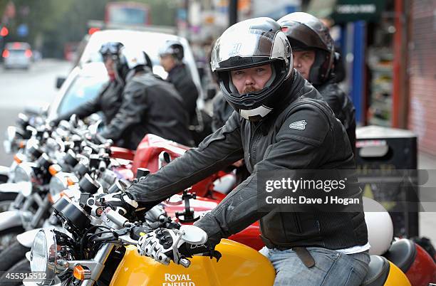 General view of riders at the Royal Enfield store ahead of a motorcycle ride to the Goodwood Revival to celebrate the unveiling of their new...