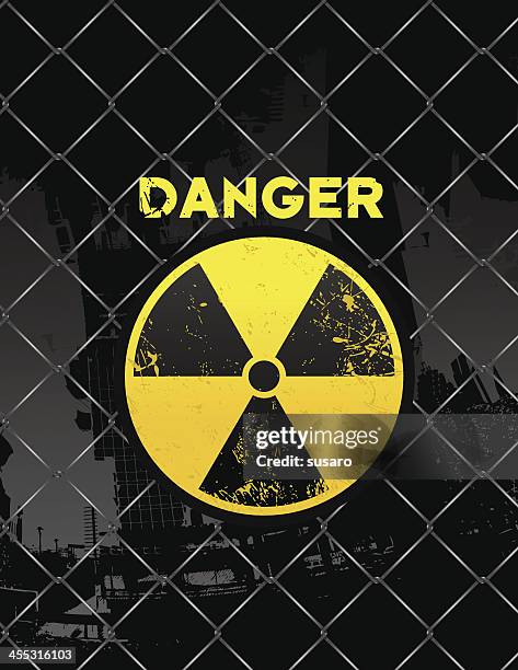 radioaktivität symbol auf mit zaun - radioactive wallpaper stock-grafiken, -clipart, -cartoons und -symbole