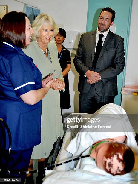 Camilla, Duchess of Cornwall opens The Haygarth Building and tours the grounds during an official visit to Countess of Chester Hospital on September...