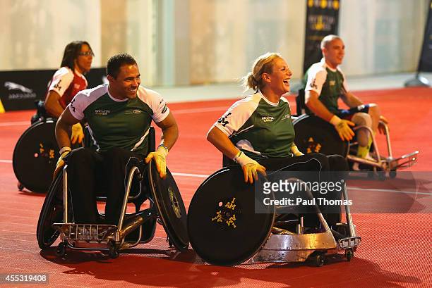 Zara Tindall laughs with Jason Robinson during a training session for the Jaguar Land Rover Exhibition Wheelchair Rugby Match on day 2 of the...