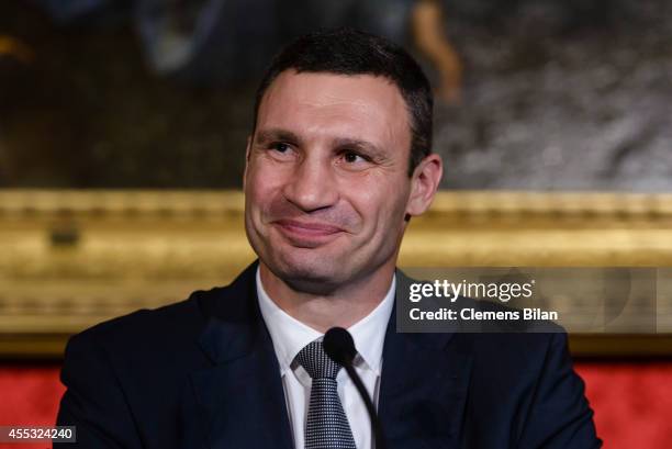 Vitali Klitschko addresses a press conference prior to the M100 Media Award 2014 on September 12, 2014 in Potsdam, Germany.