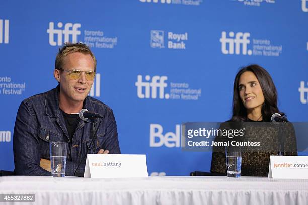 Writer/director Paul Bettany and actress Jennifer Connelly speak onstage at the "Shelter" Press Conference during the 2014 Toronto International Film...