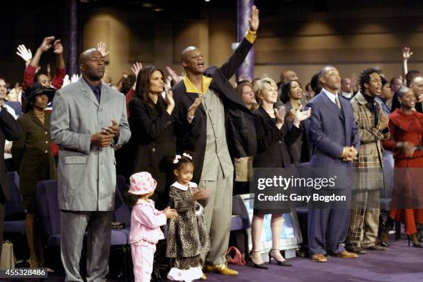 View of former MLB outfielder Darryl Strawberry with his wife Charisse and their 3-year-old daughter Jewel during services at Without Walls...