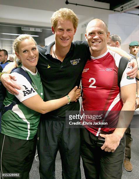 Zara Phillips, Prince Harry and Mike Tindall pose for a photograph after competing in an Exhibition wheelchair rugby match at the Copper Box ahead of...