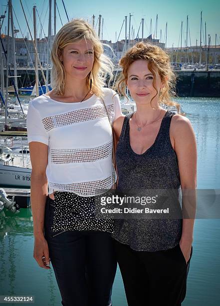 Alexia Barlier and Mathilde Lebrequier attend the photocall of 'Falco' as part of 16th Festival of TV Fiction of La Rochelle on September 12, 2014 in...