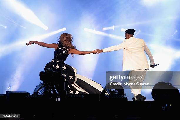 Beyonce and Jay-Z perform during the "On The Run Tour: Beyonce And Jay-Z" at the Stade de France on September 12, 2014 in Paris, France.