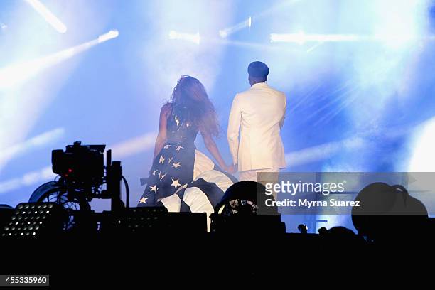 Beyonce and Jay-Z perform during the "On The Run Tour: Beyonce And Jay-Z" at the Stade de France on September 12, 2014 in Paris, France.