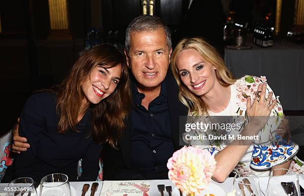 Alexa Chung, Mario Testino and co-founder Lauren Santo Domingo attend the Moda Operandi Launch Dinner at the Cafe Royal on September 12, 2014 in...