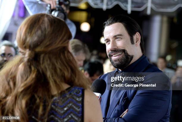 Actor John Travolta attends "The Forger" premiere during the 2014 Toronto International Film Festival at Roy Thomson Hall on September 12, 2014 in...