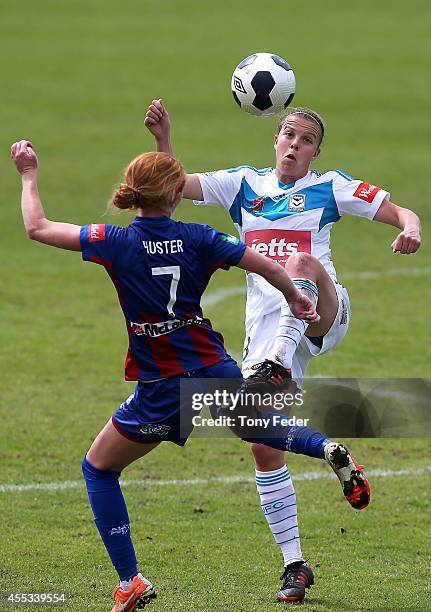 Victoria Huster of the Jets contests the ball with Amy Jackson of the Victory during the round one W-League match between the Newcastle Jets and the...