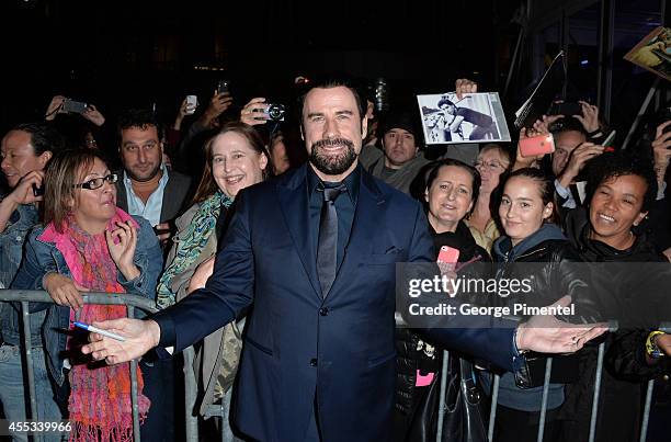 Actor John Travolta attends "The Forger" premiere during the 2014 Toronto International Film Festival at Roy Thomson Hall on September 12, 2014 in...