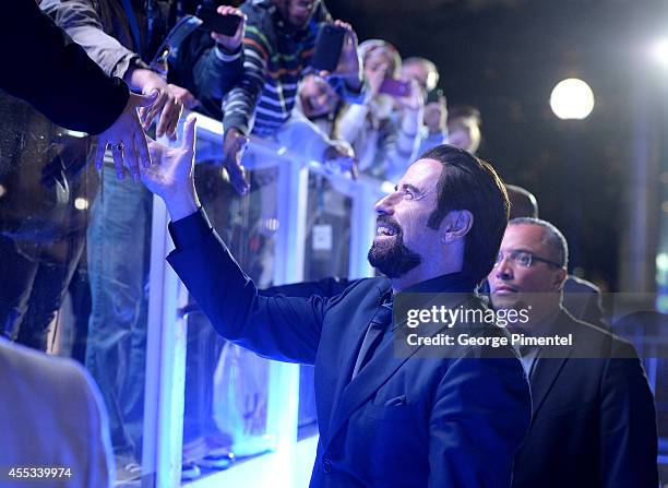 Actor John Travolta attends "The Forger" premiere during the 2014 Toronto International Film Festival at Roy Thomson Hall on September 12, 2014 in...