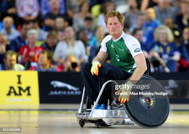 Prince Harry competes in a Wheelchair Rugby exhibition match in the Copper Box Arena during the Invictus Games on September 12, 2014 in London,...
