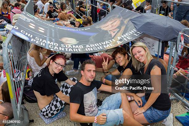 Hundreds of fans waiting for the concert by Italian rocker Luciano Ligabue, which will be held in the evening at the Olympic Stadium in Turin, with a...