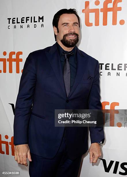 Actor John Travolta attends "The Forger" premiere during the 2014 Toronto International Film Festival at Roy Thomson Hall on September 12, 2014 in...