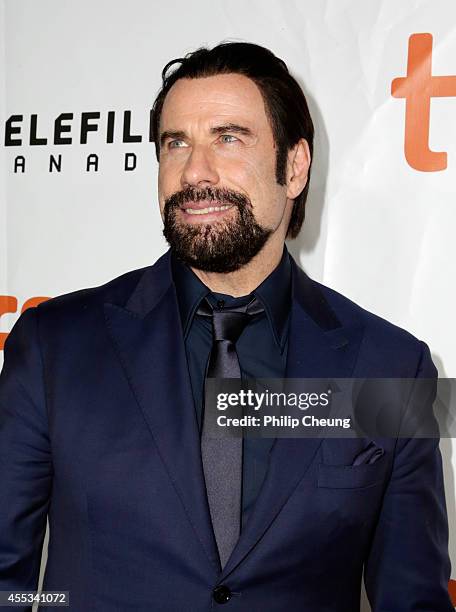 Actor John Travolta attends "The Forger" premiere during the 2014 Toronto International Film Festival at Roy Thomson Hall on September 12, 2014 in...