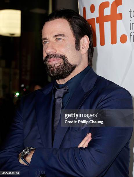 Actor John Travolta attends "The Forger" premiere during the 2014 Toronto International Film Festival at Roy Thomson Hall on September 12, 2014 in...