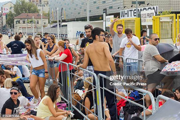 Hundreds of fans waiting for the concert by Italian rocker Luciano Ligabue, which will be held in the evening at the Olympic Stadium in Turin, with a...