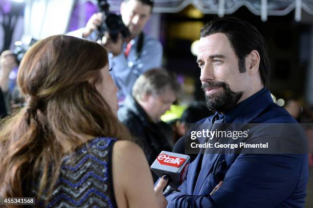 Actor John Travolta attends "The Forger" premiere during the 2014 Toronto International Film Festival at Roy Thomson Hall on September 12, 2014 in...