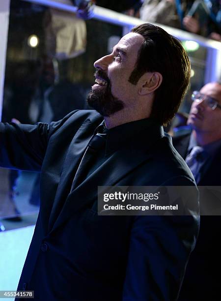 Actor John Travolta attends "The Forger" premiere during the 2014 Toronto International Film Festival at Roy Thomson Hall on September 12, 2014 in...