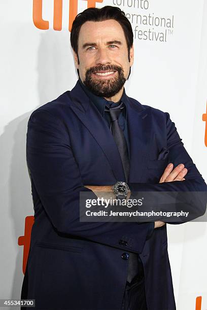 Actor John Travolta arrives at "The Forger" Premiere during the 2014 Toronto International Film Festival held at Roy Thomson Hall on September 12,...