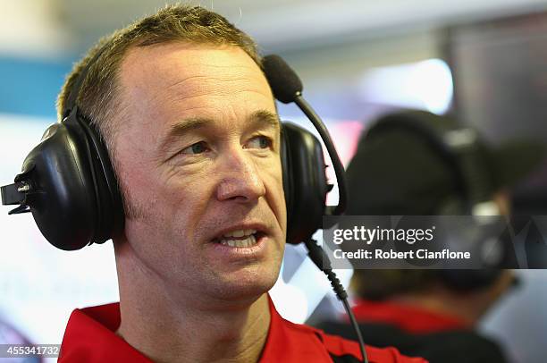 Greg Murphy driver of the Holden Racing Team Holden looks on during qualifying for the Sandown 500, which is round ten of the V8 Supercar...