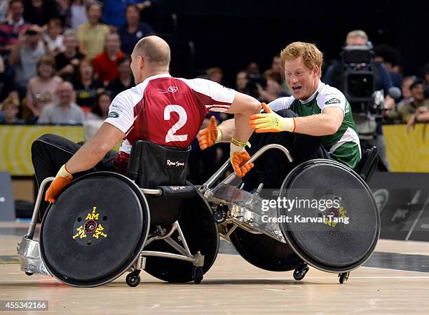 Mike Tindall and Prince Harry in action today during an exhibition match of wheelchair rugby at the Invictus Games at Copperbox, Queen Elizabeth Park...