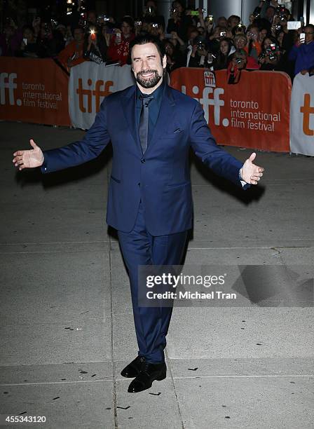 John Travolta arrives at the premiere of The Forger held during the 2014 Toronto International Film Festival - Day 9 on September 12, 2014 in...