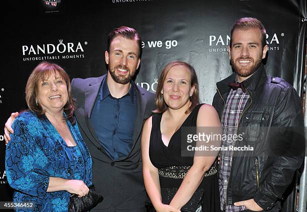 Lisa Evans, Actor/Director/Producer Chris Evans, Carly Evans and Scott Evans attend the"Before We Go" cocktail reception with Chris Evans presented...