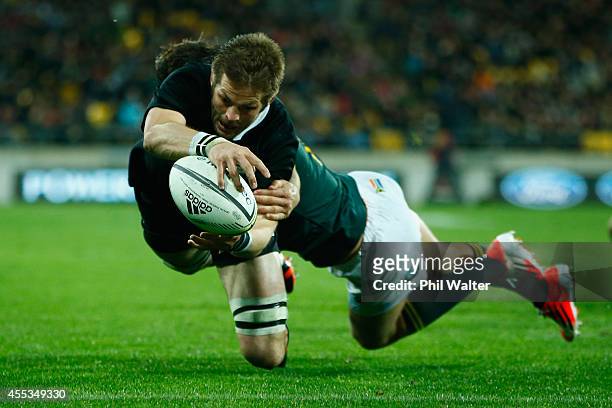 Richie McCaw of the All Blacks scores a try during The Rugby Championship match between the New Zealand All Blacks and the South Africa Springboks at...
