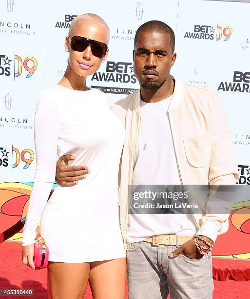 Model Amber Rose and Kanye West attend the 2009 BET Awards at The Shrine Auditorium on June 28, 2009 in Los Angeles, California.